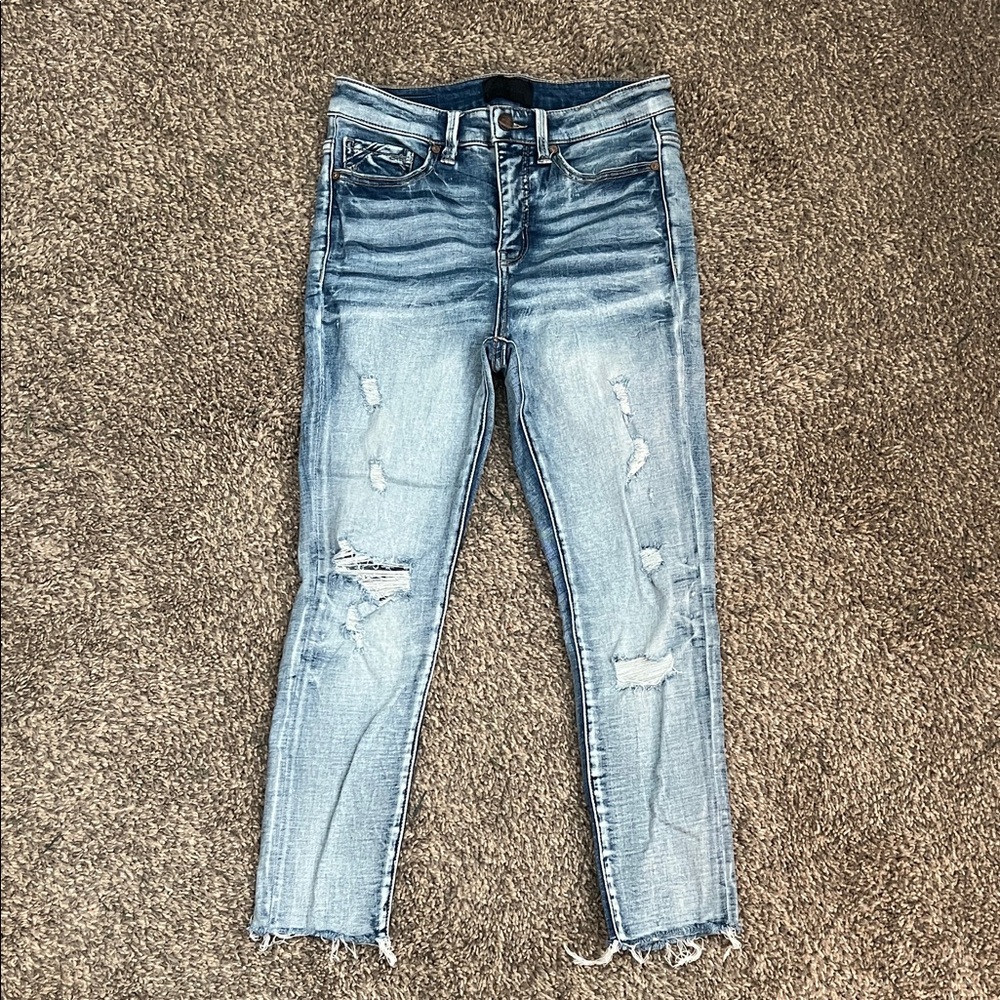 Buckle Black High Rise Ankle Skinnys